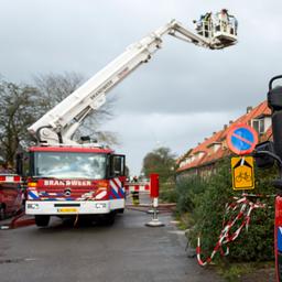 Brandweer redt vrouw die huissleutels was vergeten en op dak was geklommen