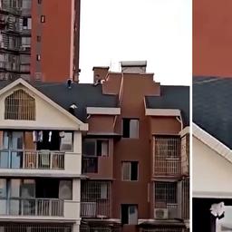 Video | Kinderen klimmen op dak appartementencomplex in China