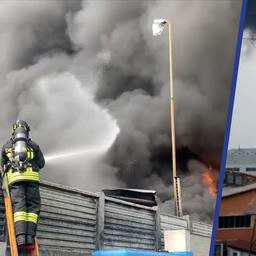 Video | Grote rookwolken stijgen uit boven Milaan na brand in fabriek